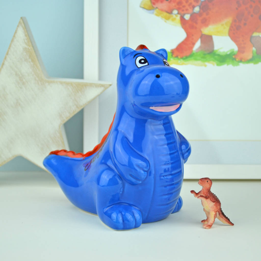 personalised dinosaur money box, red or blue by lillypea designs