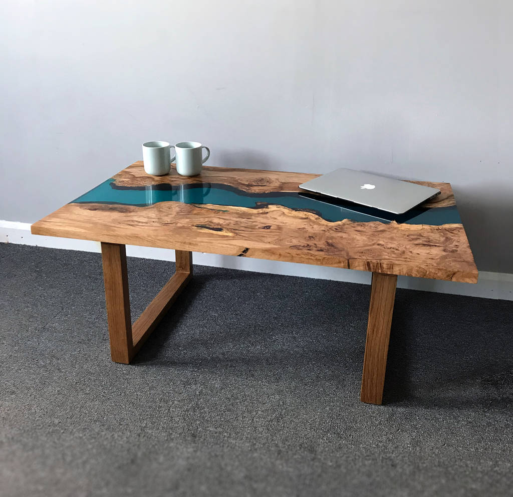 resin river coffee table with wooden legs by revive 