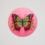Butterfly On Pink Background Circular Fridge Magnet, thumbnail 1 of 4