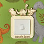 Personalised Dinosaur Wooden Light Switch Surround, thumbnail 1 of 4