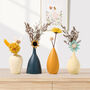 Set Of Four Small Ceramic Mini Flower Vases, thumbnail 1 of 4