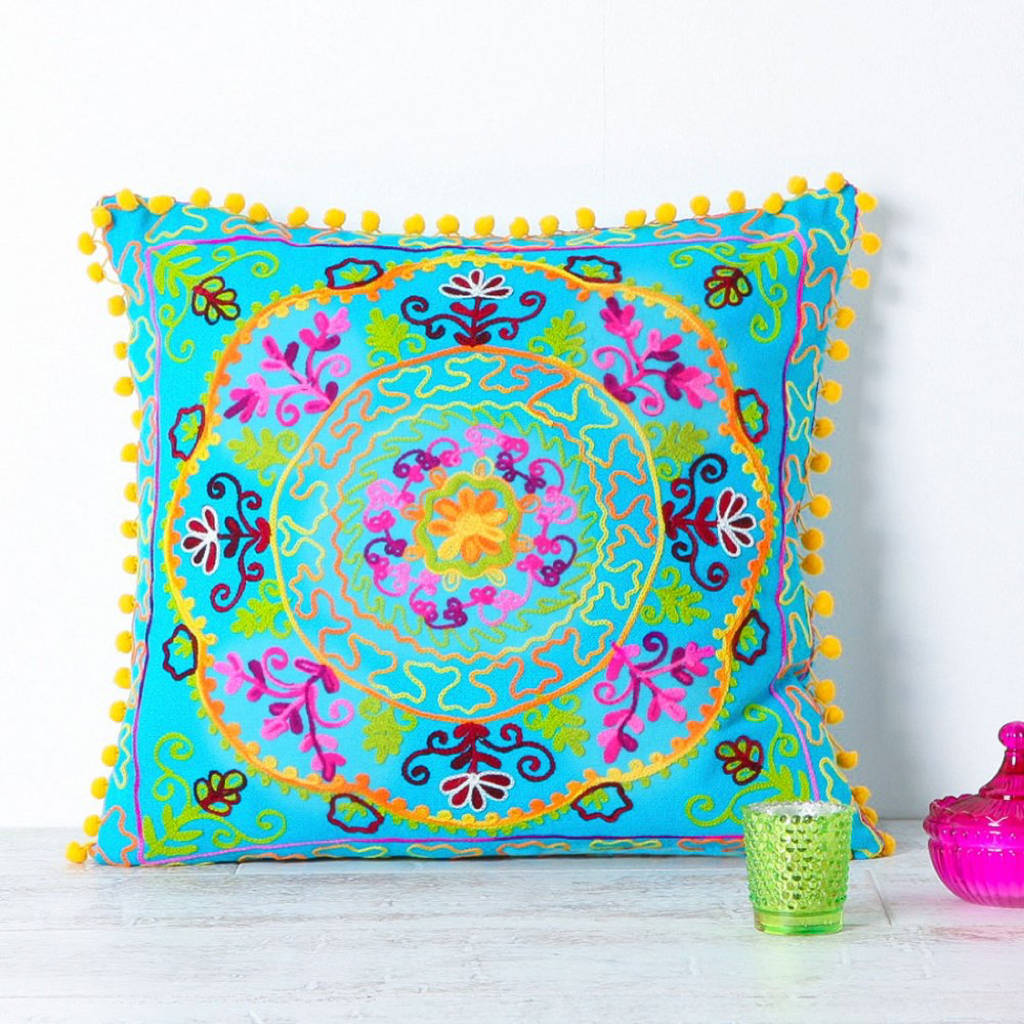 handmade embroidered turquoise and yellow cushion by all things