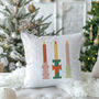Festive Candle Trio Christmas Cushion, thumbnail 3 of 5