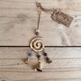 Handmade Fair Trade Brass Swirl Bell Wind Chime, thumbnail 5 of 6