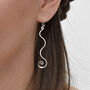 Sterling Silver Dangly Enchanted Ribbon Earrings, thumbnail 2 of 3