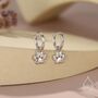 Sterling Silver Paw Print Huggie Hoop Earrings, thumbnail 1 of 11