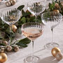 Set Of Four Ribbed Glass Champagne Saucers, thumbnail 1 of 8