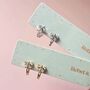 Crystal Bow Huggie Hoop Earrings, thumbnail 1 of 5