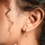 Tiny North Starburst Skye Blue Huggie Hoop Earrings, thumbnail 2 of 5