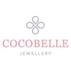 Grey and pink logo with the words 'Cocobelle' in capitals in the centre, and 'Jewellery' in smaller text underneath. There is a clover icon above.