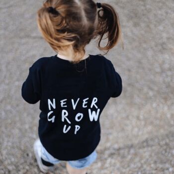 Never Grow Up Unisex Baby And Kids Short Sleeve T Shirt, 3 of 12