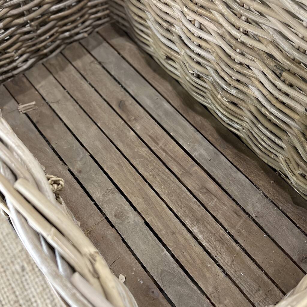 1915 Large Wicker Baskets On Wheels By Cowshed Interiors