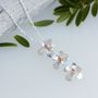 Daisy Chain Flower Necklace, Silver And Solid Rose Gold, thumbnail 1 of 5
