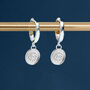 Sterling Silver Huggie Hoop Earrings With Evil Eye Protection Charms, thumbnail 1 of 8