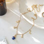 Gold Plate Lapis Lazuli Moon And Stars Charm Necklace, thumbnail 1 of 5
