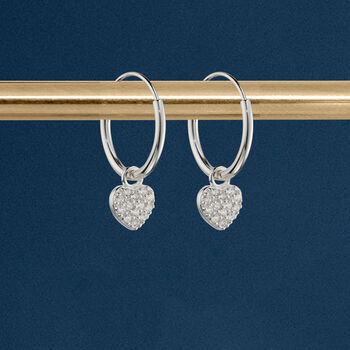 Sterling Silver Huggie Hoop Earrings With Twinkling Heart Charms, 2 of 8