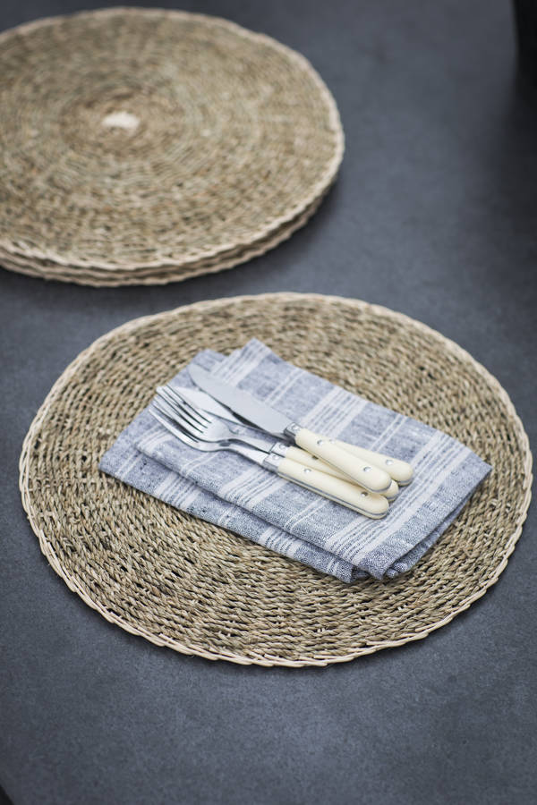 set of four seagrass placemats by garden trading