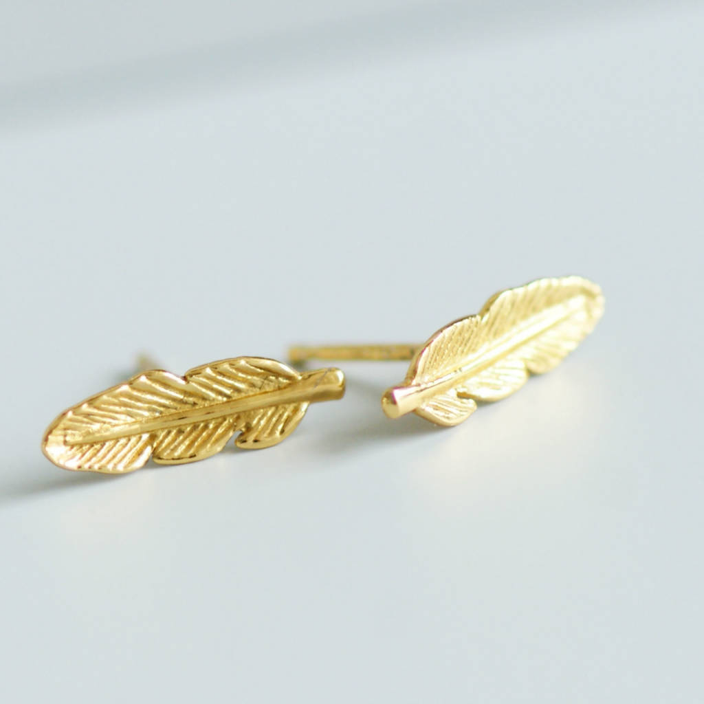 gold vermeil feather stud earrings by amulette | notonthehighstreet.com