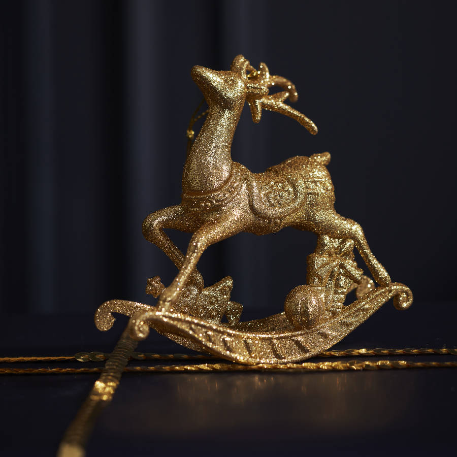 gold reindeer rocking horse decoration set of three by the gold reindeer rocking horse decoration set of three by the