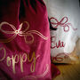 Personalised Christmas Eve Bow Sack Or Stocking, thumbnail 2 of 9