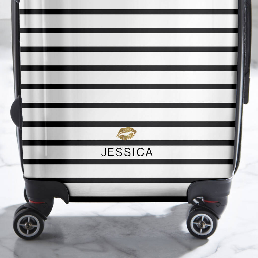 black and white striped luggage