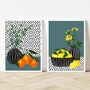 Oranges And Lemons Against A Spotty Background, thumbnail 2 of 12