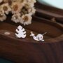 Sterling Silver Mismatched Snail And Monstera Leaf Stud Earrings, thumbnail 4 of 9