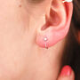 Tiny Sterling Silver Crescent Star Huggie Hoops, thumbnail 1 of 5