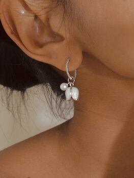 White Enamel Lily And Pearl Huggie Hoop Earrings, 4 of 7
