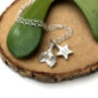 Personalised Sterling Silver Small Holly Initial Star Christmas Necklace, thumbnail 1 of 12