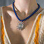 Navy Bead And Sun Pendant Necklace, thumbnail 4 of 5