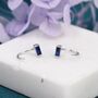 Sterling Silver Sapphire Blue Baguette Cut Cz Huggie Hoop Earrings, thumbnail 1 of 9
