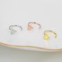 Sterling Silver Tiny Triangle Huggie Hoop Earrings, thumbnail 1 of 12