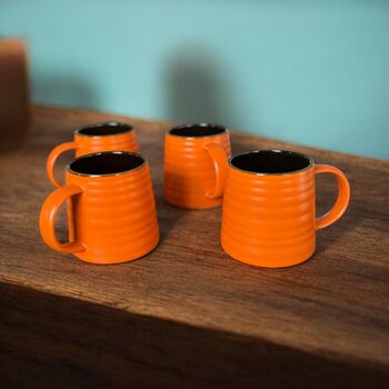 Set Of Four Reactive Glaze Brûlée Mugs In Pumpkin Orange And Brown, 2 of 3