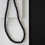 Mens Brass And Black Onyx Crystal Necklace, thumbnail 1 of 2