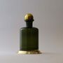 Deep Green Glass Decanter With Brass Base, thumbnail 1 of 2