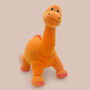 Dinosaur Soft Toy And Personalised Pyjamas, Orange, thumbnail 2 of 9