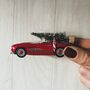 Red Mercedes 300 Sl With Christmas Tree, thumbnail 1 of 2