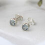 Sterling Silver Blue Topaz Stud Earrings, thumbnail 8 of 10