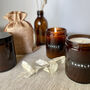Personalised Sustainable Amber Glass Candle, thumbnail 1 of 3