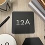 Monochrome Laser Cut Square House Number, thumbnail 1 of 11