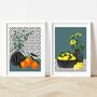Oranges And Lemons Against A Spotty Background, thumbnail 1 of 12