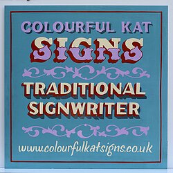 Traditional Signwriter handpainted lettering and scrollwork