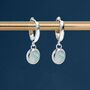 Sterling Silver Huggie Hoop Earrings With Round Seafoam Chalcedony Charms, thumbnail 1 of 8