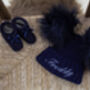 Personalised Navy Blue Double Pom Pom Winter Hat And Booties, thumbnail 1 of 9