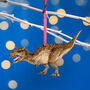 Wooden Carnotaurus Dinosaur Christmas Tree Decoration, thumbnail 1 of 3