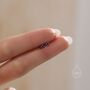 Sterling Silver Very Tiny 2mm Sapphire Blue Cz Stud Earrings, thumbnail 2 of 12