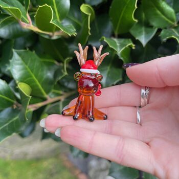 Hand Blown Glass Reindeer With Santa Hat, 2 of 6