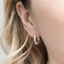 Sterling Silver Oval Huggies, thumbnail 2 of 4