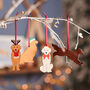 Set Of Four Retriever Dog Christmas Tree Decorations, thumbnail 1 of 3